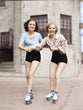 Load image into Gallery viewer, Vintage Portrait of Two Young Women Roller Skating Wall Art Print