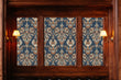Load image into Gallery viewer, Victorian blue and orange floral damask fabric peel and stick wallpaper