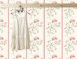 Load image into Gallery viewer, Pink vintage floral fabric peel and stick wallpaper with girls dress hanging on rack