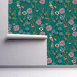 Load image into Gallery viewer, Blue and pink Victorian antique Chinoiserie bird floral fabric peel and stick wallpaper on wall partially rolled up