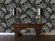 Load image into Gallery viewer, Black and white gothic skull fabric peel and stick wallpaper with mantle and silver lamps