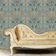 Load image into Gallery viewer, Blue Art Nouveau bird Victorian antique fabric peel and stick in room with gold sofa