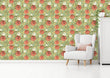 Load image into Gallery viewer, Antique pink and green floral fabric peel and stick wallpaper in room with chair and wardrobe