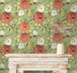 Load image into Gallery viewer, Antique pink and green floral fabric peel and stick wallpaper in room with fire mantle