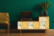 Load image into Gallery viewer, Victorian antique gold peacock Chinoiserie fabric peel and stick wallpaper on vintage record player with plant and chair