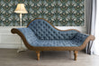 Load image into Gallery viewer, Antique Art Nouveau black and blue bird fabric peel and stick wallpaper in room with blue sofa