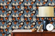 Load image into Gallery viewer, Dark botanical tropical palm leaves fabric peel and stick wallpaper with cabinet and lamp