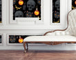 Load image into Gallery viewer, Black and orange Victorian gothic skull fabric peel and stick wallpaper with white sofa