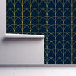 Load image into Gallery viewer, Blue and gold geometric antique Art Deco fabric peel and stick wallpaper on wall partially rolled up