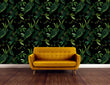 Load image into Gallery viewer, Dark moody botanical forest fabric peel and stick fabric wallpaper with orange sofa