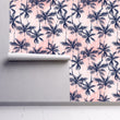 Load image into Gallery viewer, Vintage retro palm tree pink and blue fabric peel and stick wallpaper on wall partially rolled up