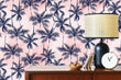 Load image into Gallery viewer, Vintage retro palm tree pink and blue fabric peel and stick wallpaper with cabinet, lamp and clock