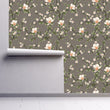 Load image into Gallery viewer, Victorian antique grey and pink botanical floral fabric peel and stick wallpaper on wall partially rolled up