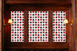 Load image into Gallery viewer, Black and red deck of cards eclectic fabric peel and stick wallpaper on wall with lamps