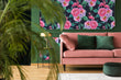 Load image into Gallery viewer, Dark black and pink tropical floral flamingo fabric peel and stick wallpaper with pink sofa and plant