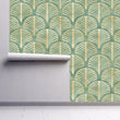 Load image into Gallery viewer, Green and gold antique geometric Art Deco fabric peel and stick wallpaper on wall partially rolled up
