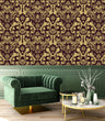 Load image into Gallery viewer, Ornate gold damask Victorian fabric peel and stick wallpaper with green chair and coffee table