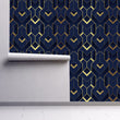 Load image into Gallery viewer, Blue and gold geometric Art Deco fabric peel and stick wallpaper on wall partially rolled up