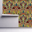 Load image into Gallery viewer, Red and green ornate antique Art Nouveau fabric peel and stick wallpaper on wall partially rolled up