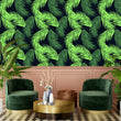Load image into Gallery viewer, Neon green tropical palm leaves fabric peel and stick wallpaper with chairs and coffee table