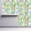 Load image into Gallery viewer, Green and blue wildflower garden cottage fabric peel and stick wallpaper on wall partially rolled up