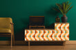 Load image into Gallery viewer, Bold orange and blue geometric retro vintage fabric peel and stick wallpaper on vintage radio with plant and chair