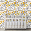 Load image into Gallery viewer, Yellow and grey botanical floral fabric peel and stick wallpaper with baby crib