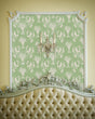 Load image into Gallery viewer, Light green English Chinoiserie botanical fabric peel and stick wallpaper with antique bed