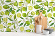 Load image into Gallery viewer, Green citrus limes vintage floral fabric peel and stick wallpaper with cutting board, bowls and cooking utensils