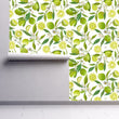 Load image into Gallery viewer, Green citrus limes vintage floral fabric peel and stick wallpaper on wall partially rolled up