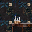 Load image into Gallery viewer, Dark tropical peel and stick wallpaper with side table and gold accent bottles