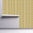 Load image into Gallery viewer, Vintage Gold Baroque Stripe Wallpaper partially rolled up on a wall.