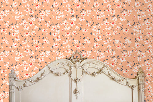 Pink Victorian chintz floral peel and stick wallpaper with antique bed