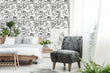 Load image into Gallery viewer, Black and white antique floral fabric blend peel and stick wallpaper
