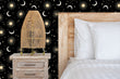 Load image into Gallery viewer, Black and mauve sun and stars celestial fabric peel and stick wallpaper
