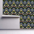 Load image into Gallery viewer, Victorian antique dark floral fabric peel and stick wallpaper on wall partially rolled up
