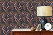 Load image into Gallery viewer, Dark moody tropical leaves fabric peel and stick wallpaper in room with cabinet and lamp
