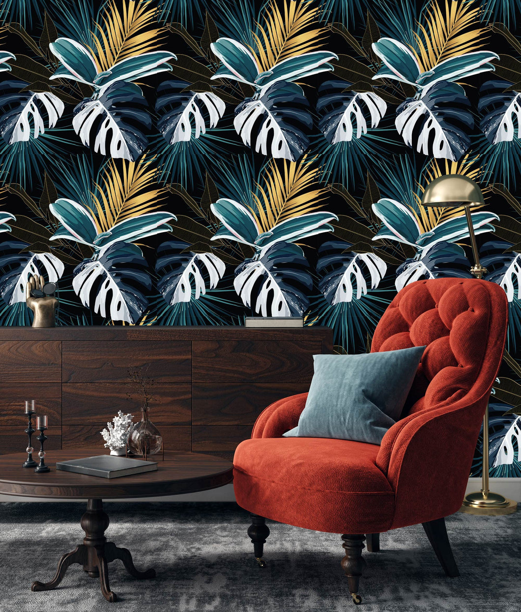 Dark botanical tropical palm leaves fabric peel and stick wallpaper in room with cabinet, chair and table