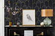 Load image into Gallery viewer, Moody dark Art Deco black and gold fabric peel and stick wallpaper in room with piano, picture and lamp
