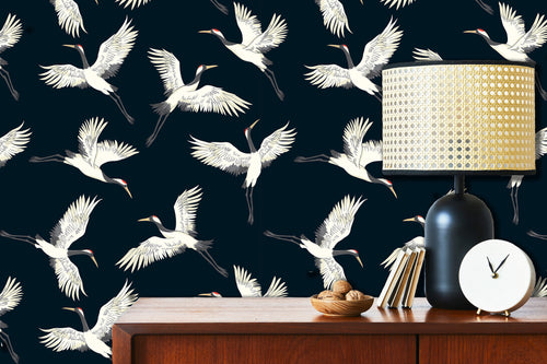 White and blue moody crane bird Chinoiserie fabric peel and stick wallpaper with cabinet, lamp and clock