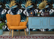 Load image into Gallery viewer, Dark botanical tropical palm leaves fabric peel and stick wallpaper in room with chair and furniture
