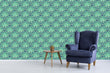 Load image into Gallery viewer, Vintage abstract blue Art Deco peacock fabric peel and stick wallpaper with blue chair, table and plant
