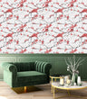 Load image into Gallery viewer, Pink Chinoiserie floral cherry blossom botanical fabric peel and stick wallpaper with green chair and coffee table

