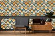 Load image into Gallery viewer, Vintage retro Mid-century Modern geometric fabric peel and stick wallpaper in room with chair and vintage record player
