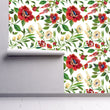 Load image into Gallery viewer, Vintage red flower garden fabric peel and stick wallpaper on wall partially rolled up
