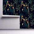 Load image into Gallery viewer, Black topical parrot Victorian Chinoiserie fabric peel and stick wallpaper on wall partially rolled up

