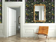Load image into Gallery viewer, Cottagecore botanical floral dark fabric peel and stick wallpaper in room with mirror and chair
