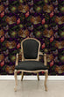 Load image into Gallery viewer, Owls keys and butterflies dark cottagecore fabric peel and stick wallpaper with black chair
