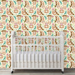 Load image into Gallery viewer, Cute tropical sloth kid&#39;s fabric peel and stick wallpaper in nursery with crib
