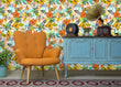 Load image into Gallery viewer, Orange and yellow vintage retro tropical butterfly garden fabric peel and stick wallpaper with blue cabinet and orange chair
